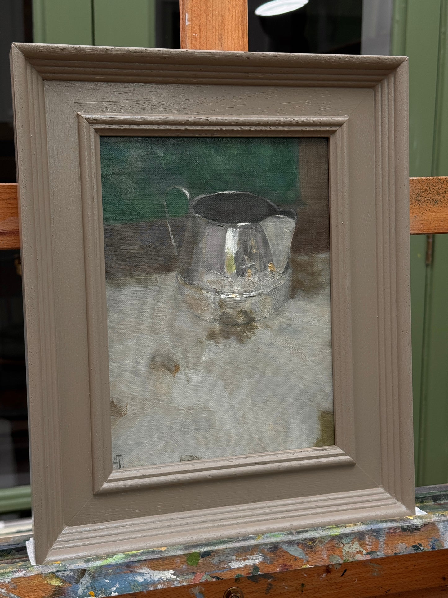The framed artwork as photographed from the side.