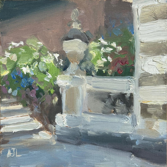 An original oil painting of an ornate vase by Italian architecture with colourful hydrangea flowers in the background.