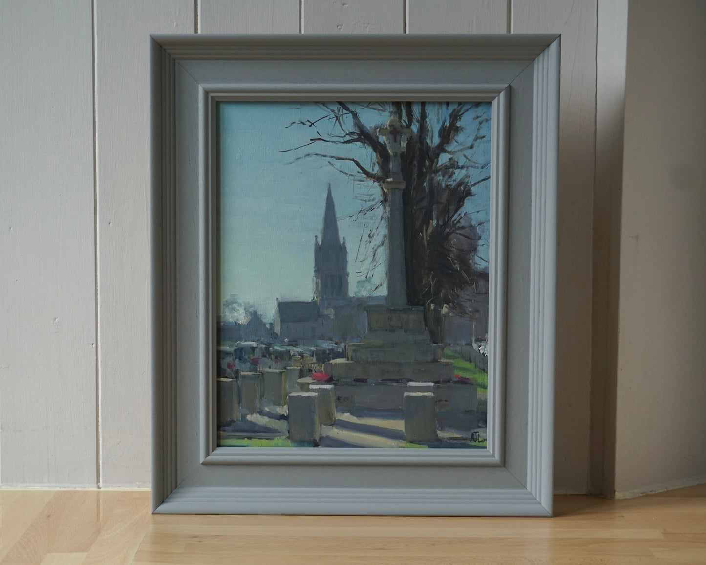 The original artwork in a grey frame.
