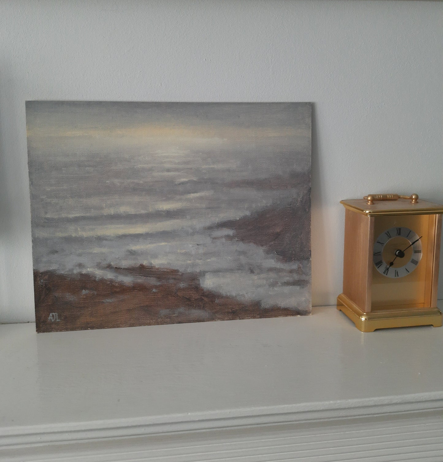 The original artwork on a mantlepiece.