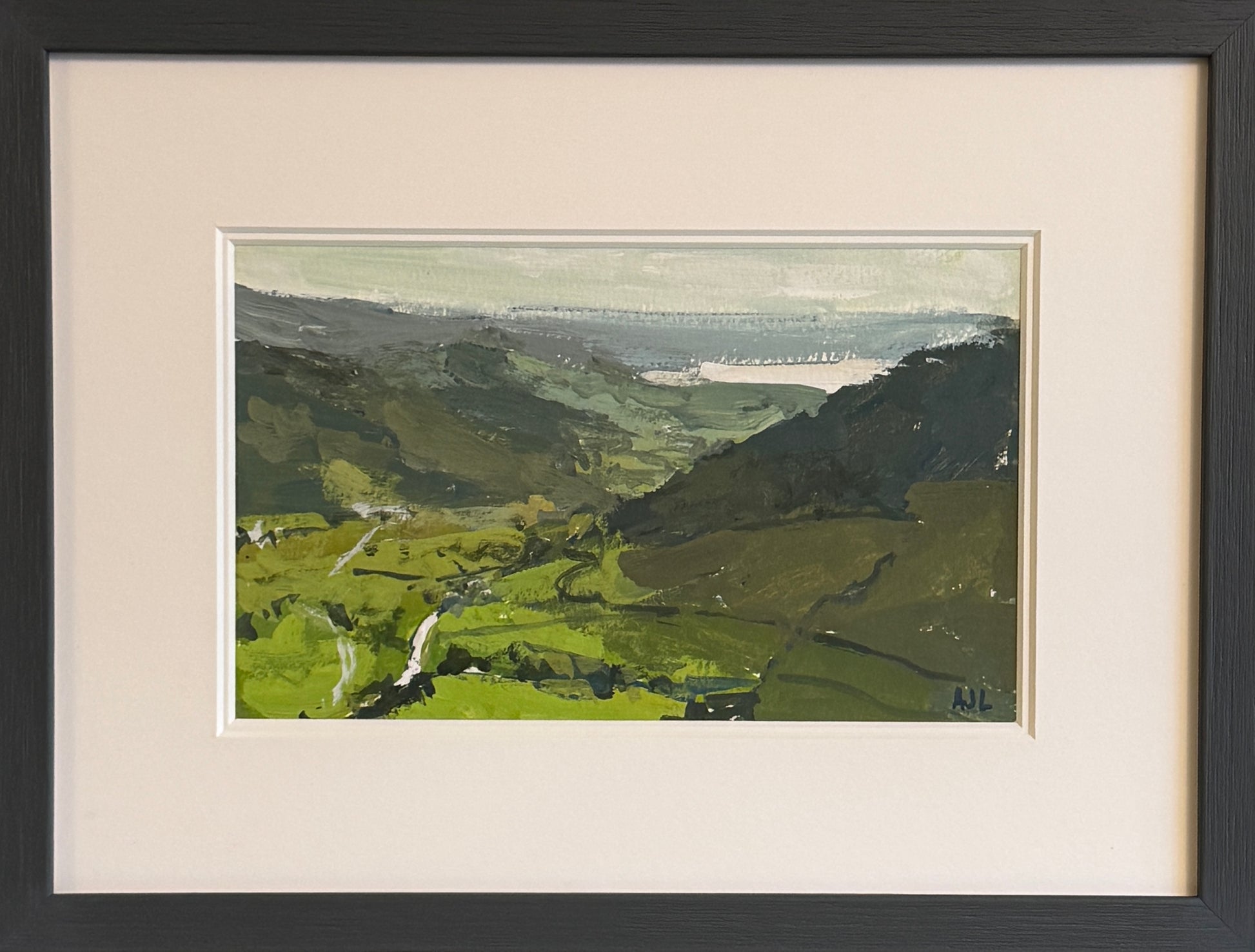 The painting, framed.