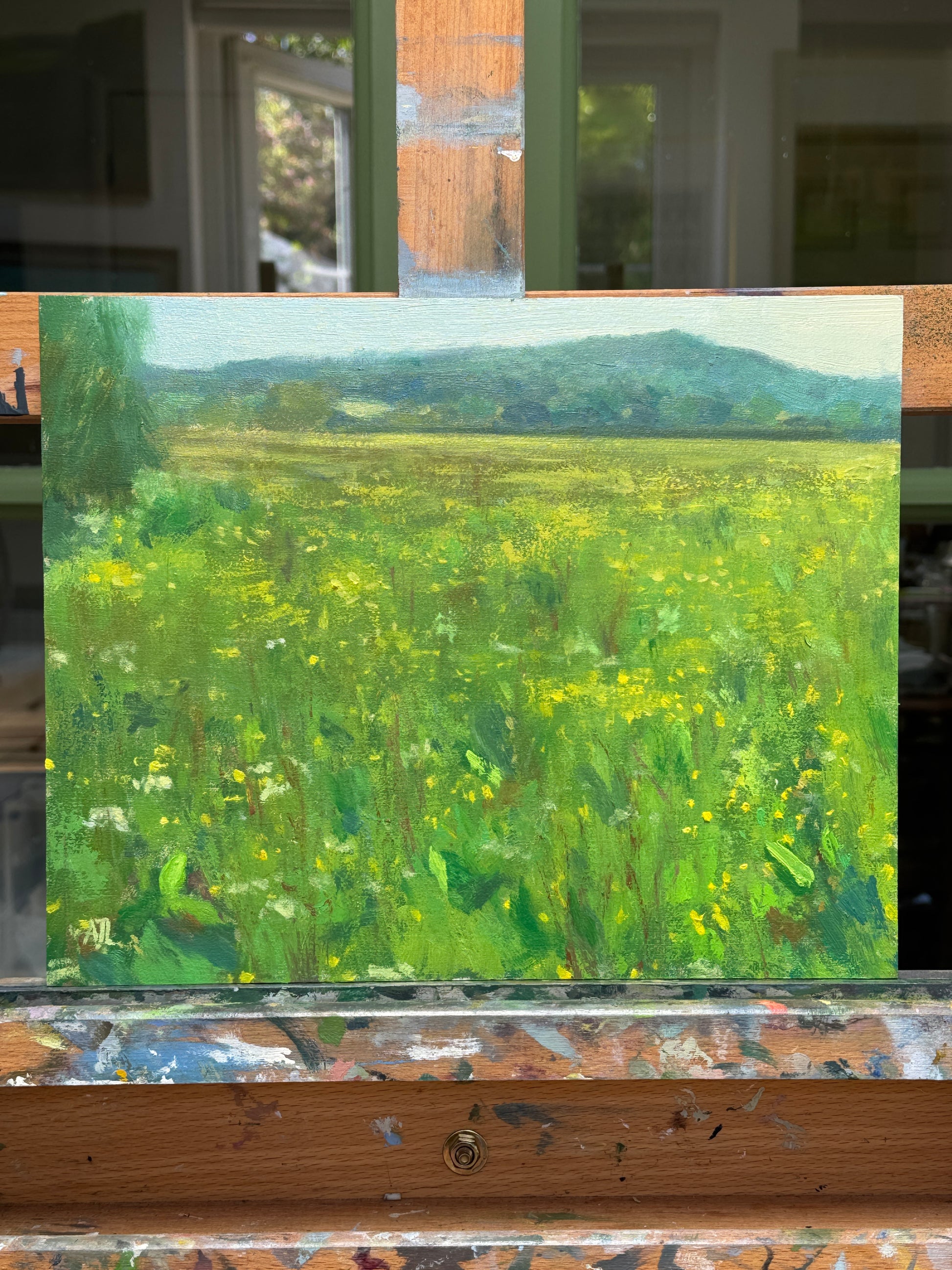 The original artwork photographed from the front as it sits on the artist easel.