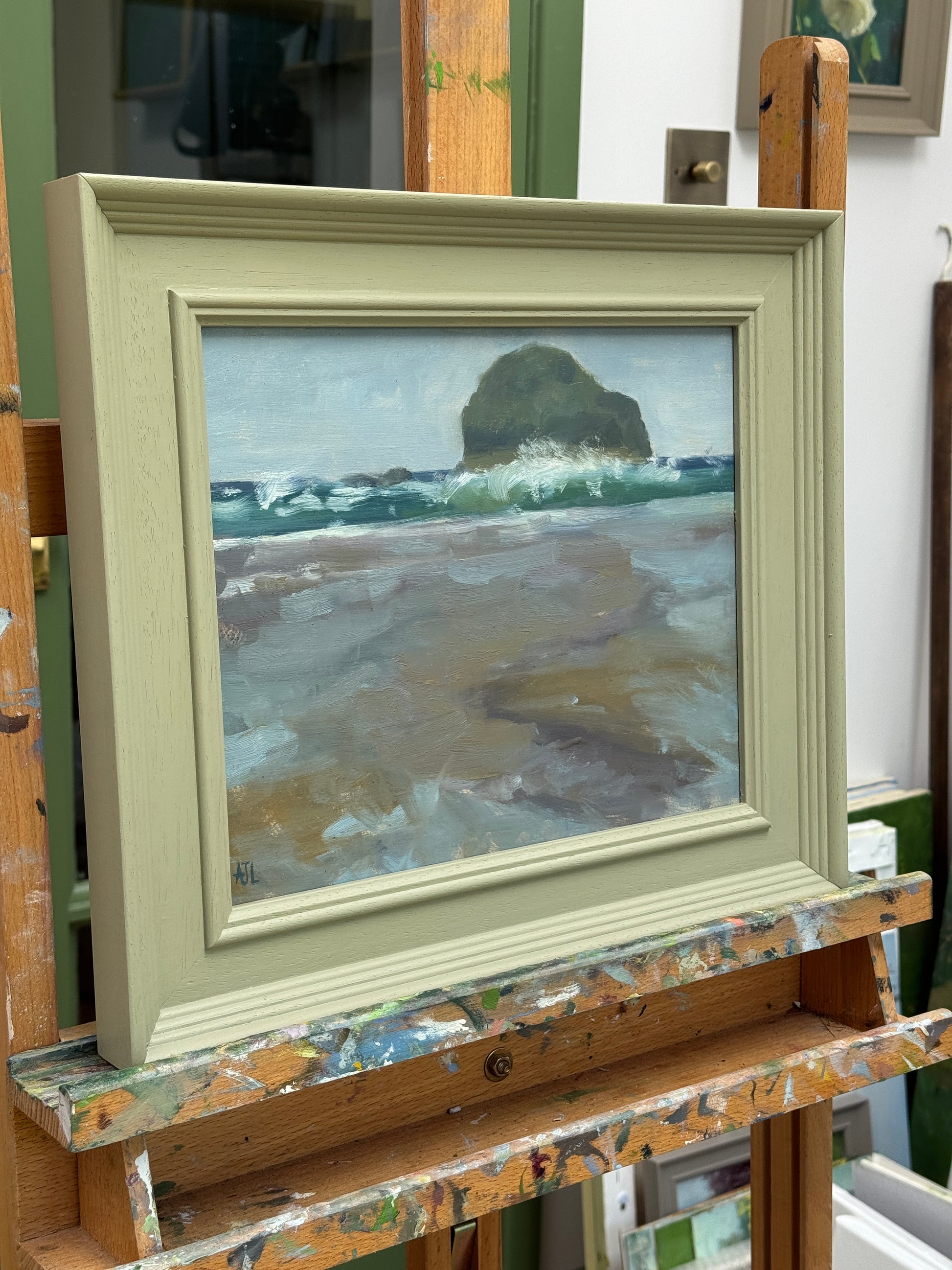 A side view of the framed artwork.