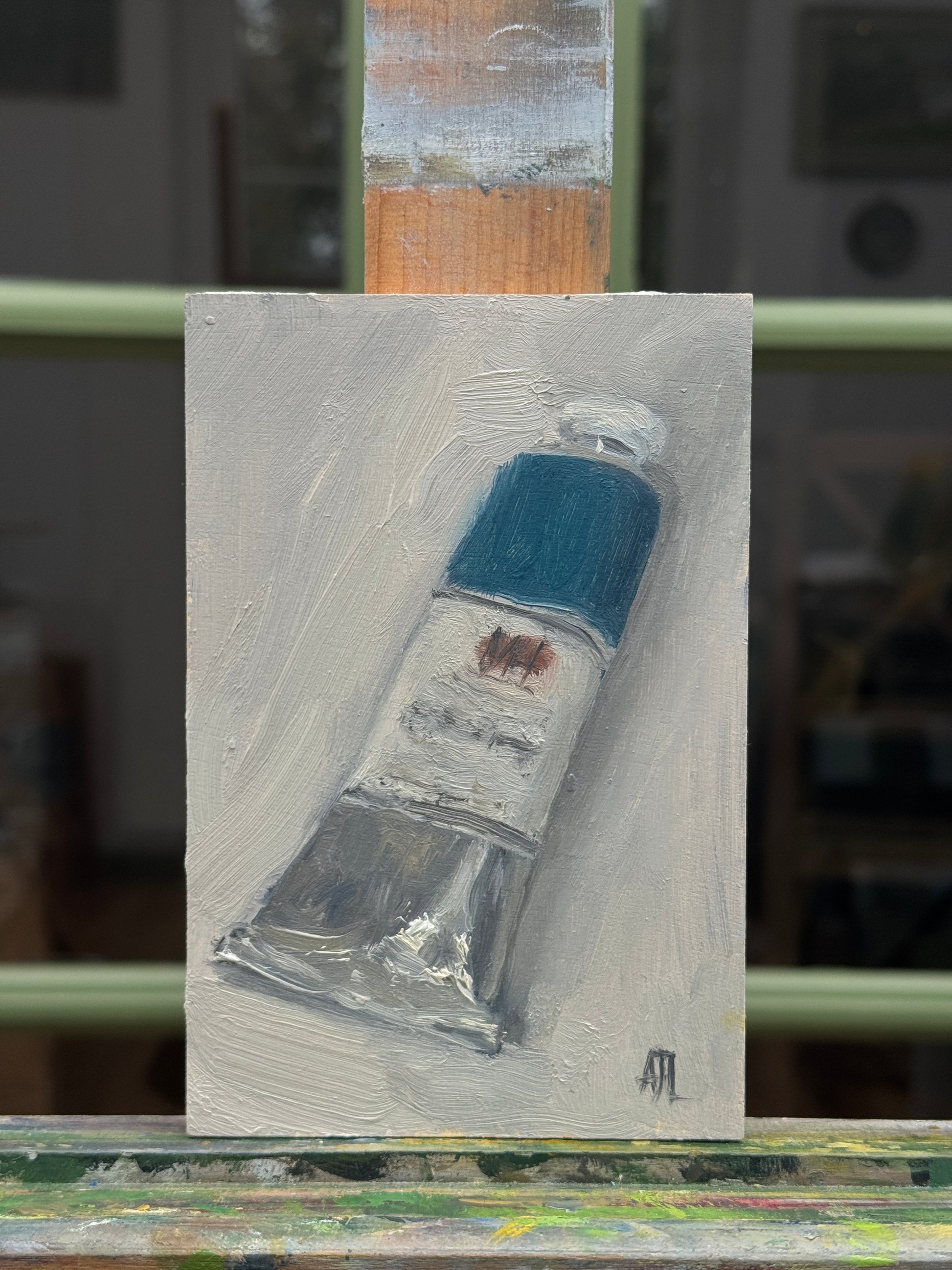 The painting as seen from the front on the artist easel.