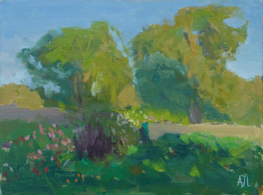 An original oil painting of a garden at Cogges Manor Farm, capturing the evening light as it falls across two large trees, with a hint of blooming flowers in the shade in the foreground. The artist has signed AJL in light blue, for "Alex James Long", at the bottom right of the artwork. 