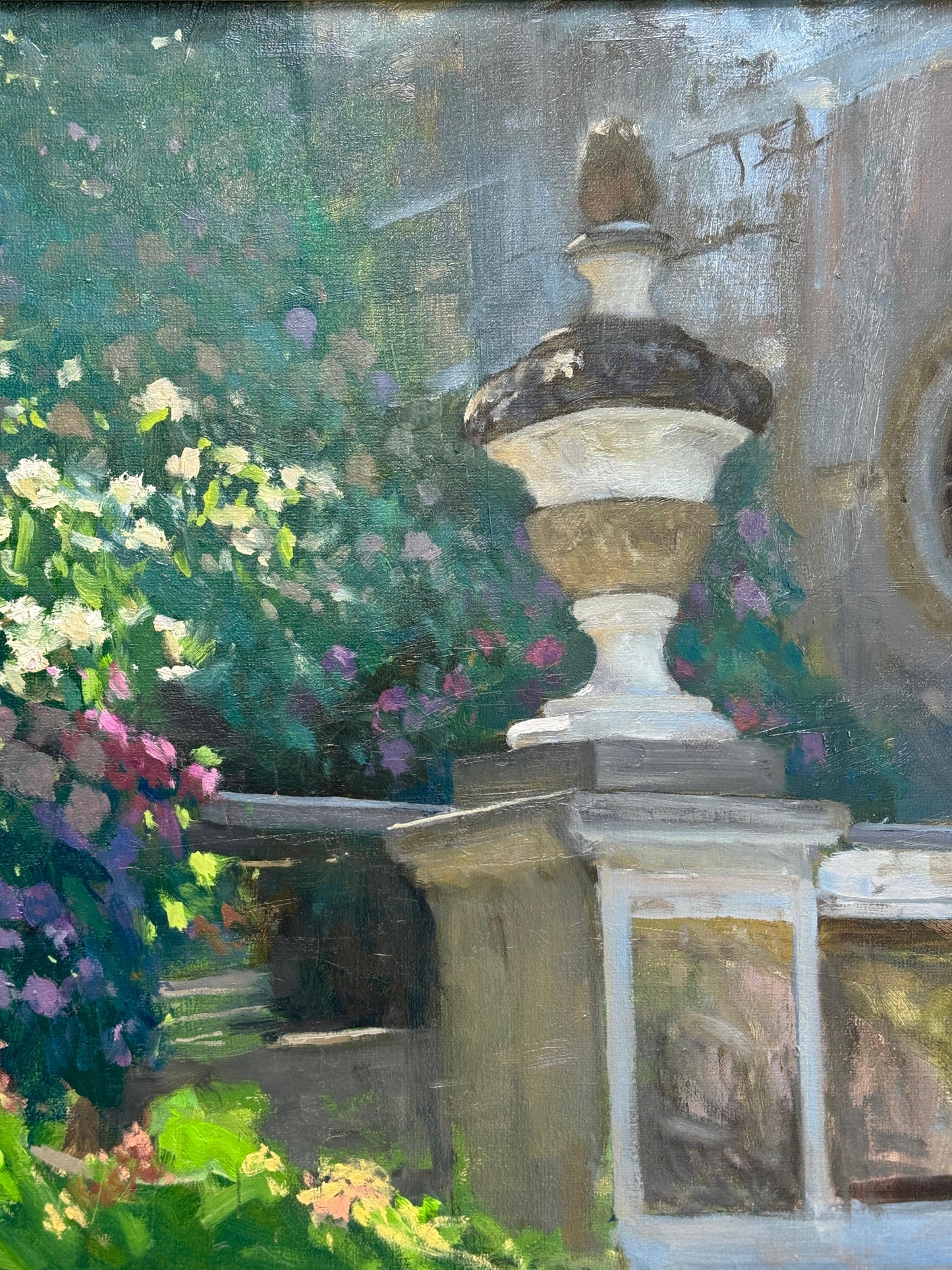 Painting of a garden scene with a fountain and flowers
