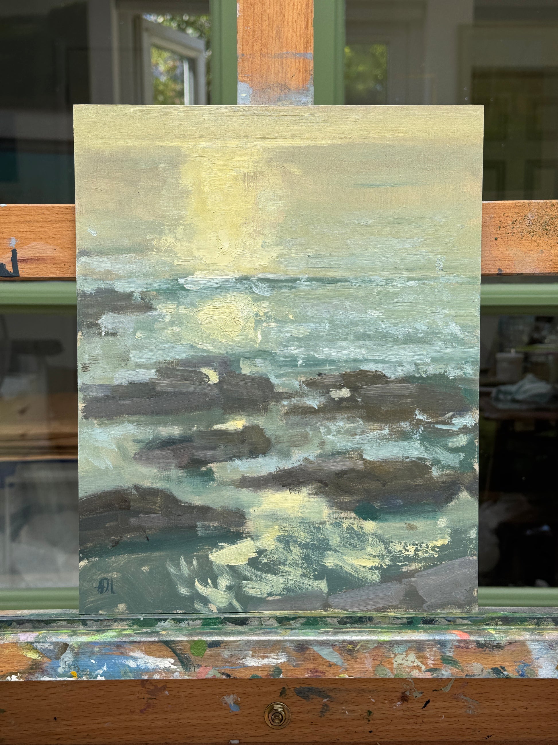 The original artwork on the artist easel.