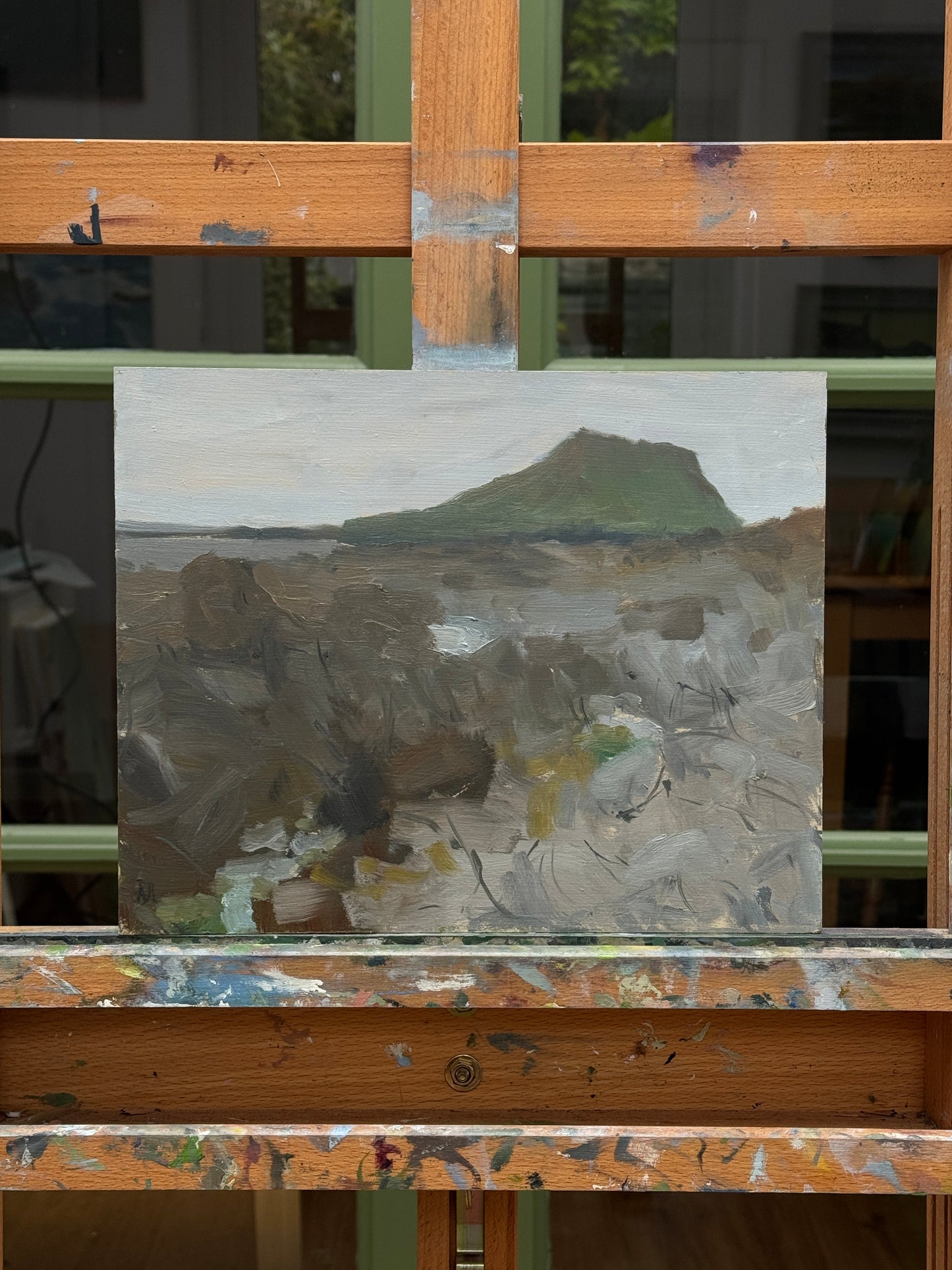 The original artwork on an easel.