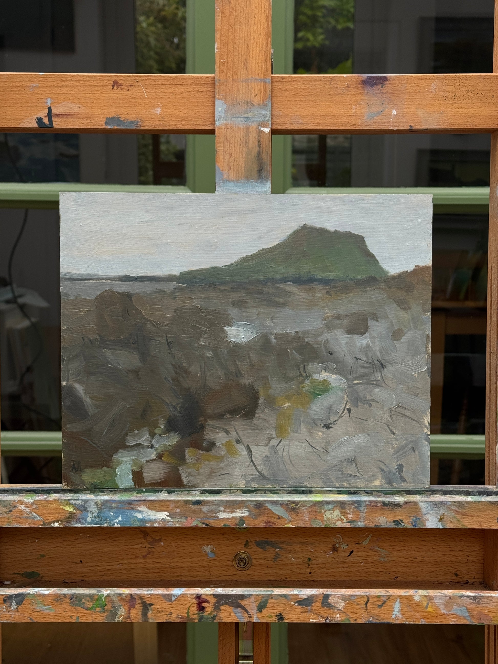 The original artwork on an easel.