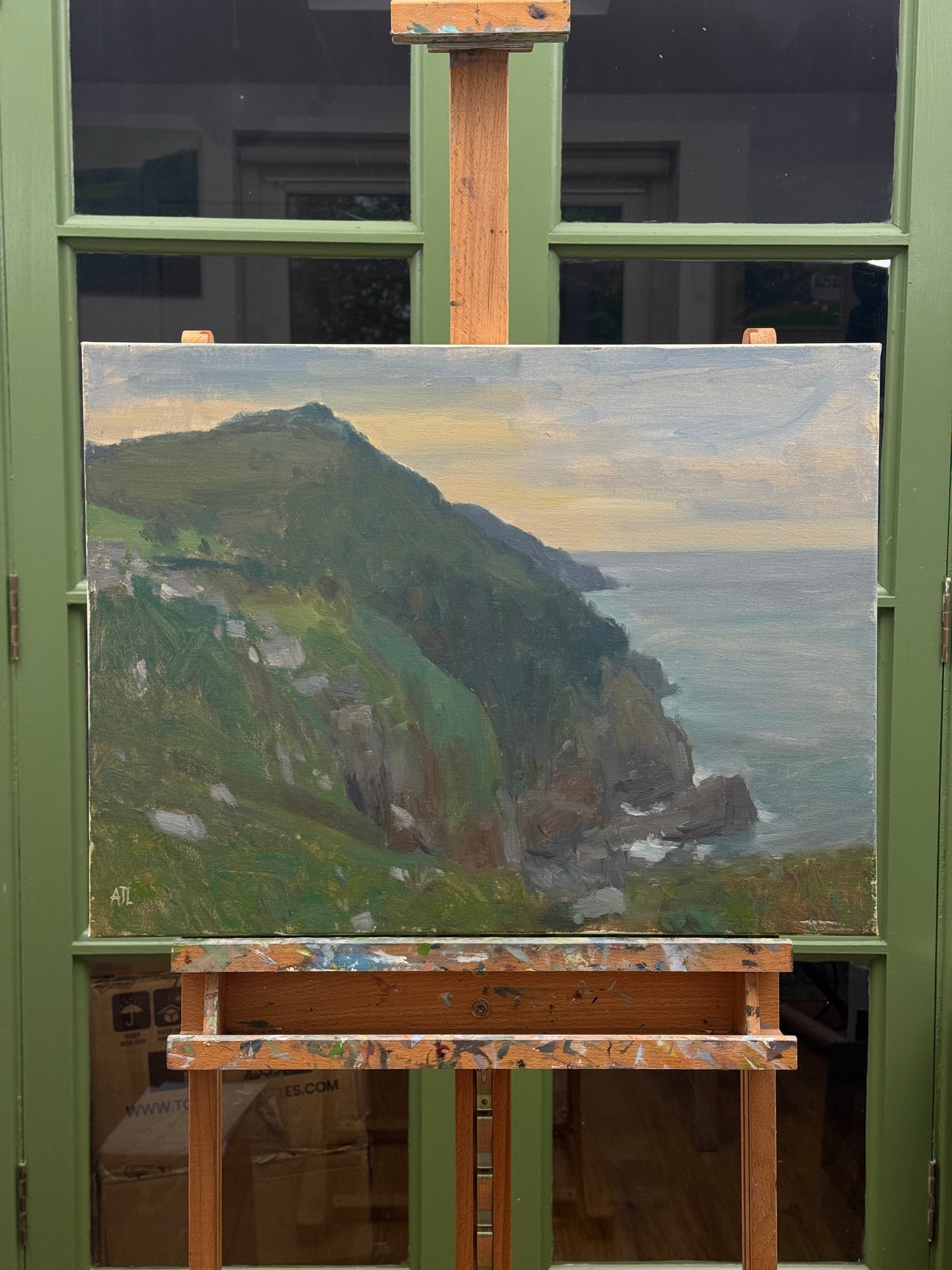 The painting seen from the front in the artist studio.