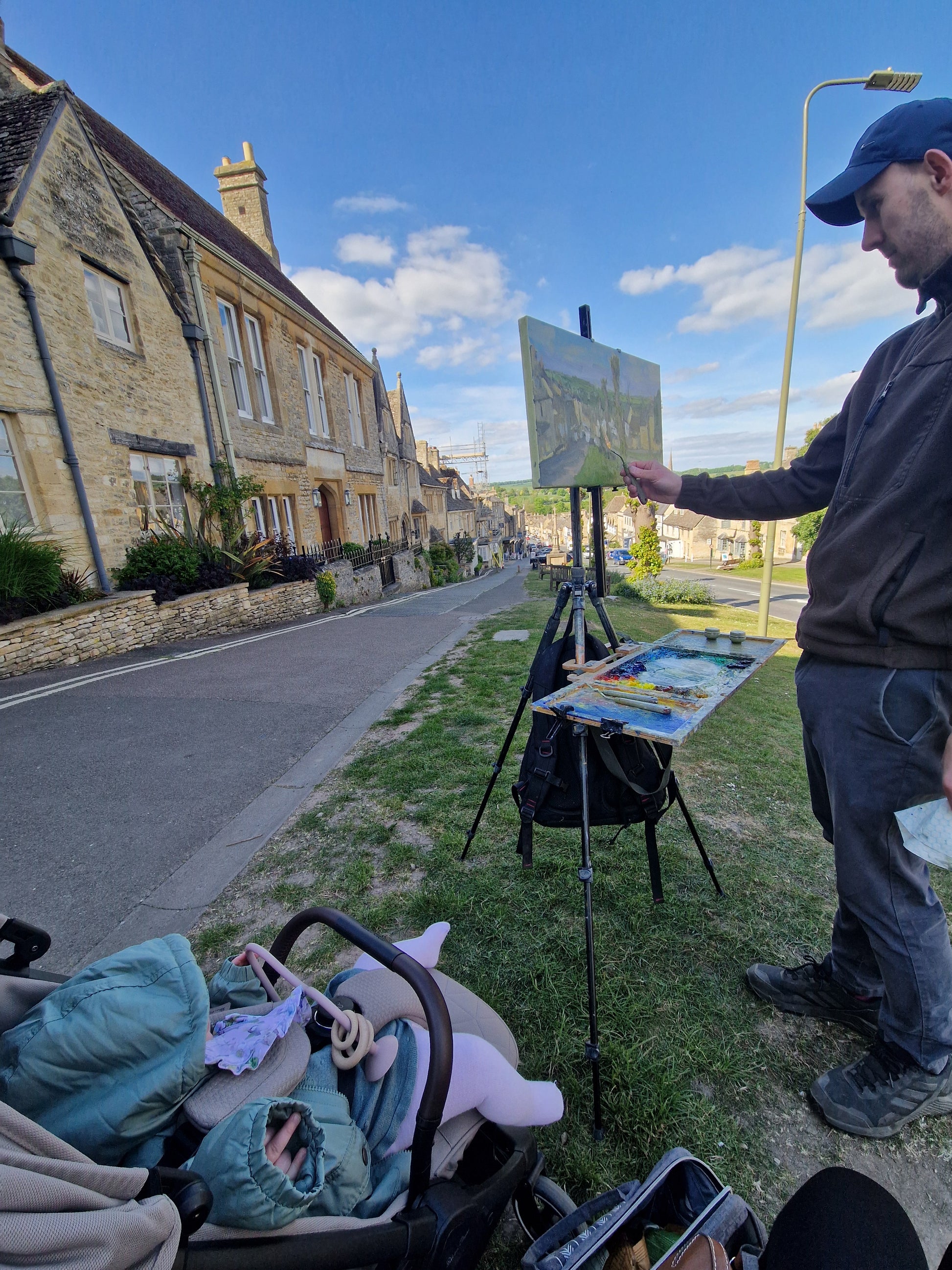 Finishing the painting with an audience.