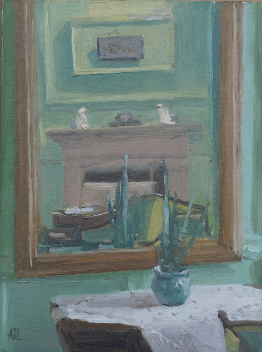 An original oil painting of a green interior room at Cogges Manor Farm, mostly through the view of a mirror placed in front of a table, which reflects a fireplace and a hanging artwork. The artist has signed AJL, for "Alex James Long", at the bottom left of the artwork.