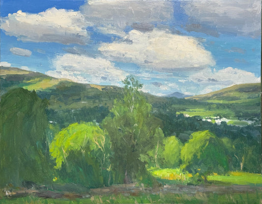 An original landscape painting of green hills and trees under a blue sky with clouds.