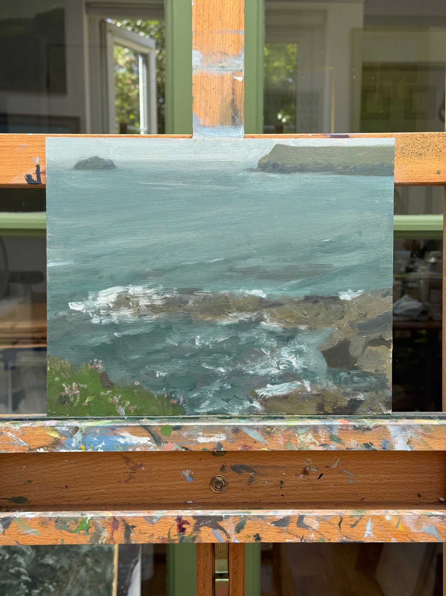 The original artwork resting on the artist easel.