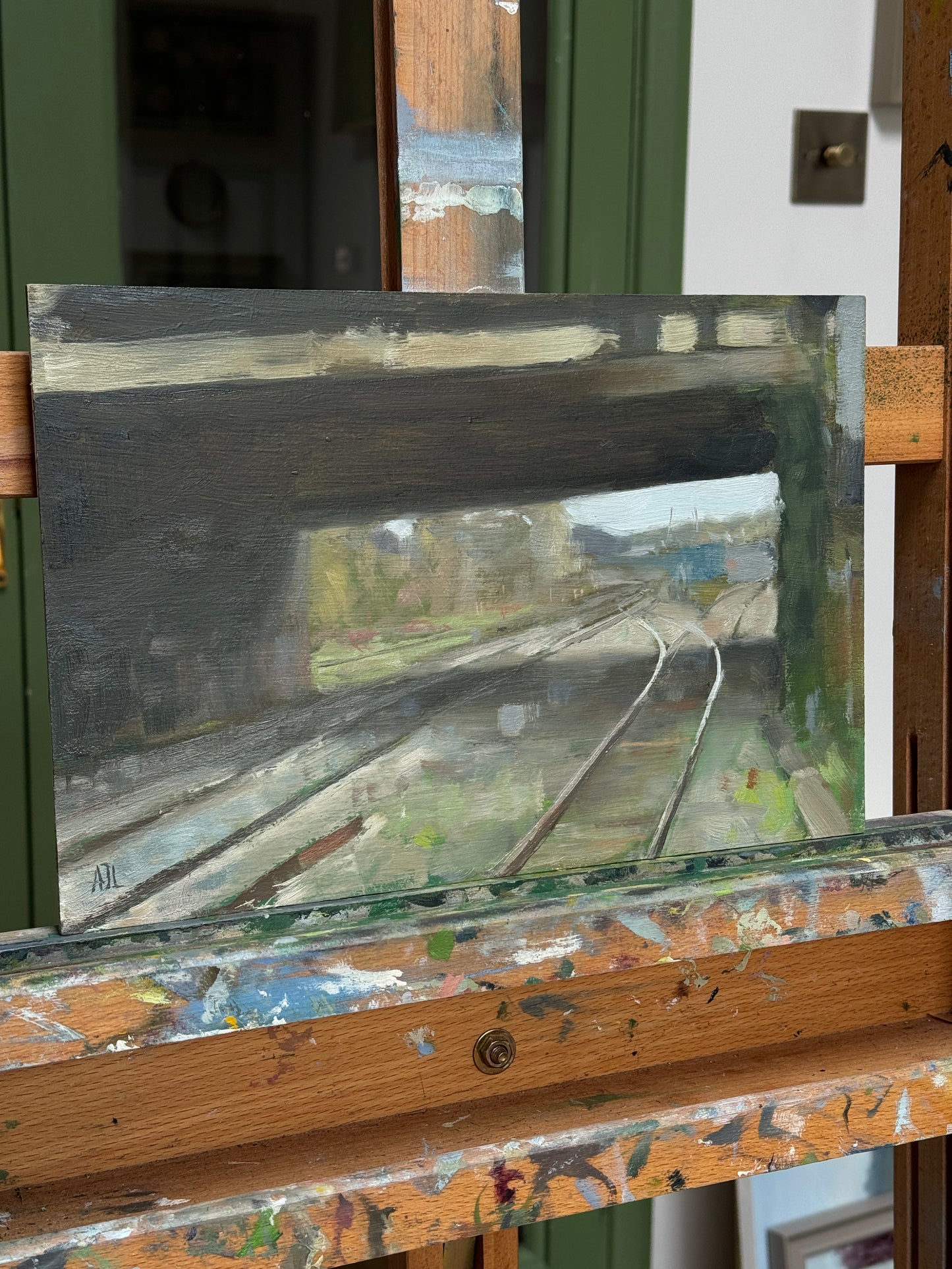 The painting on an artist easel.