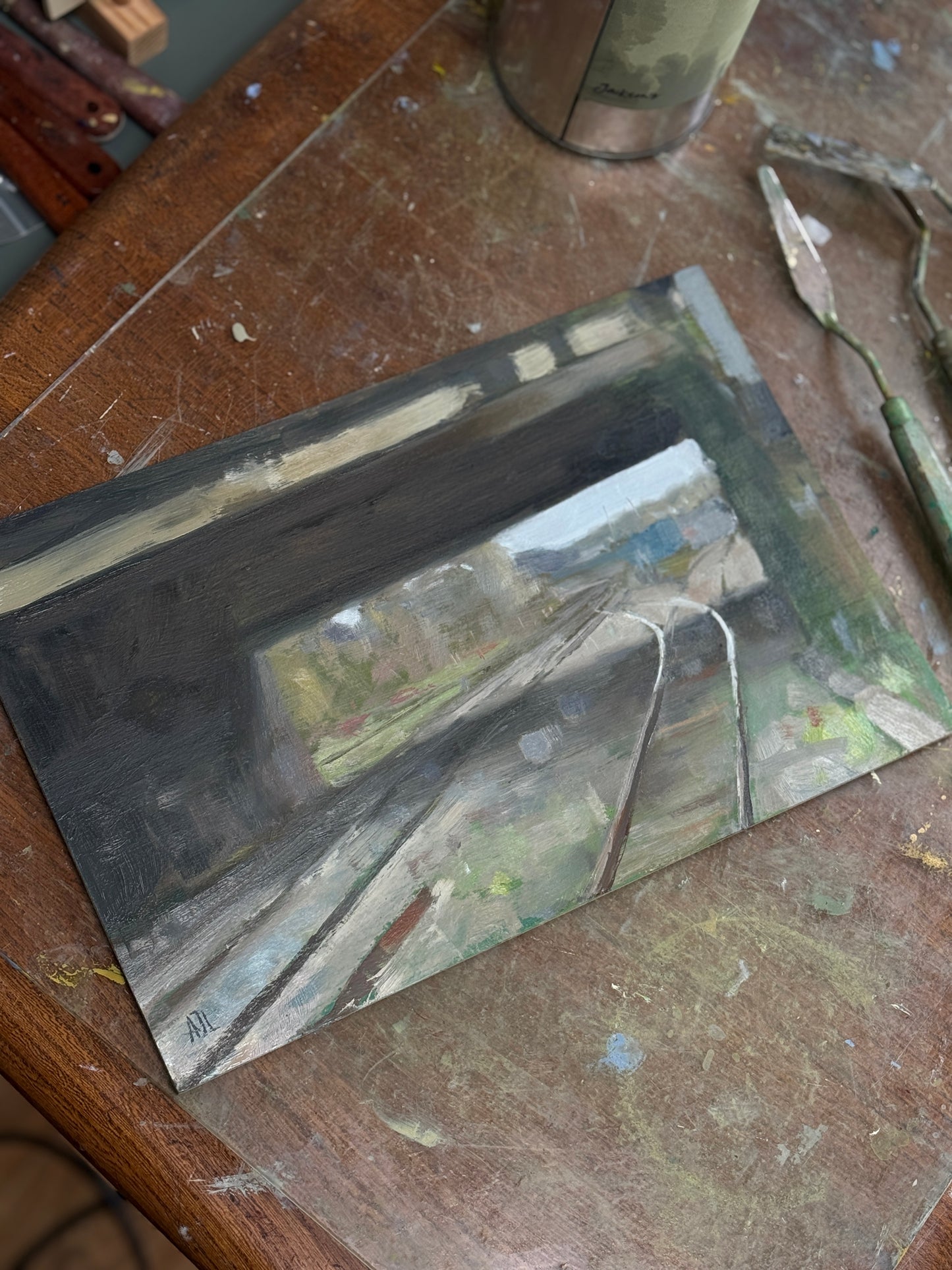 The painting in the studio.
