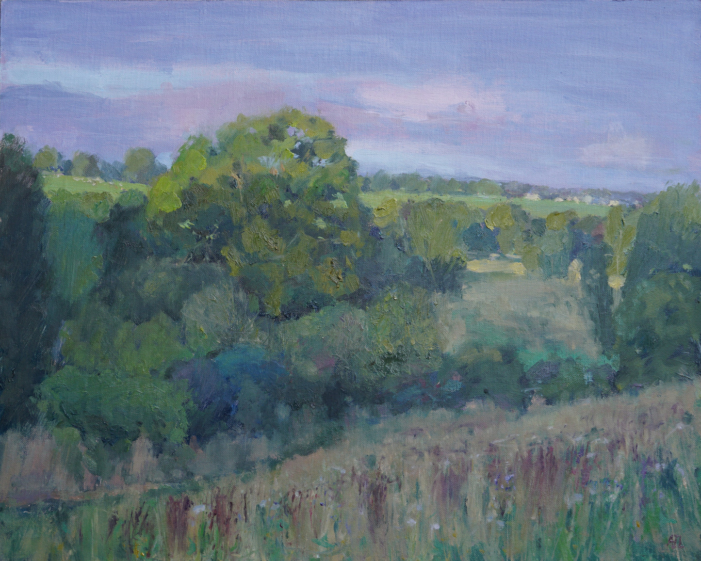 An original oil landscape painting, showing the evening light hitting a large oak tree in the near distance and fields and houses in the far distance. The artist has signed AJL in red, for "Alex James Long", at the bottom right of the artwork. 