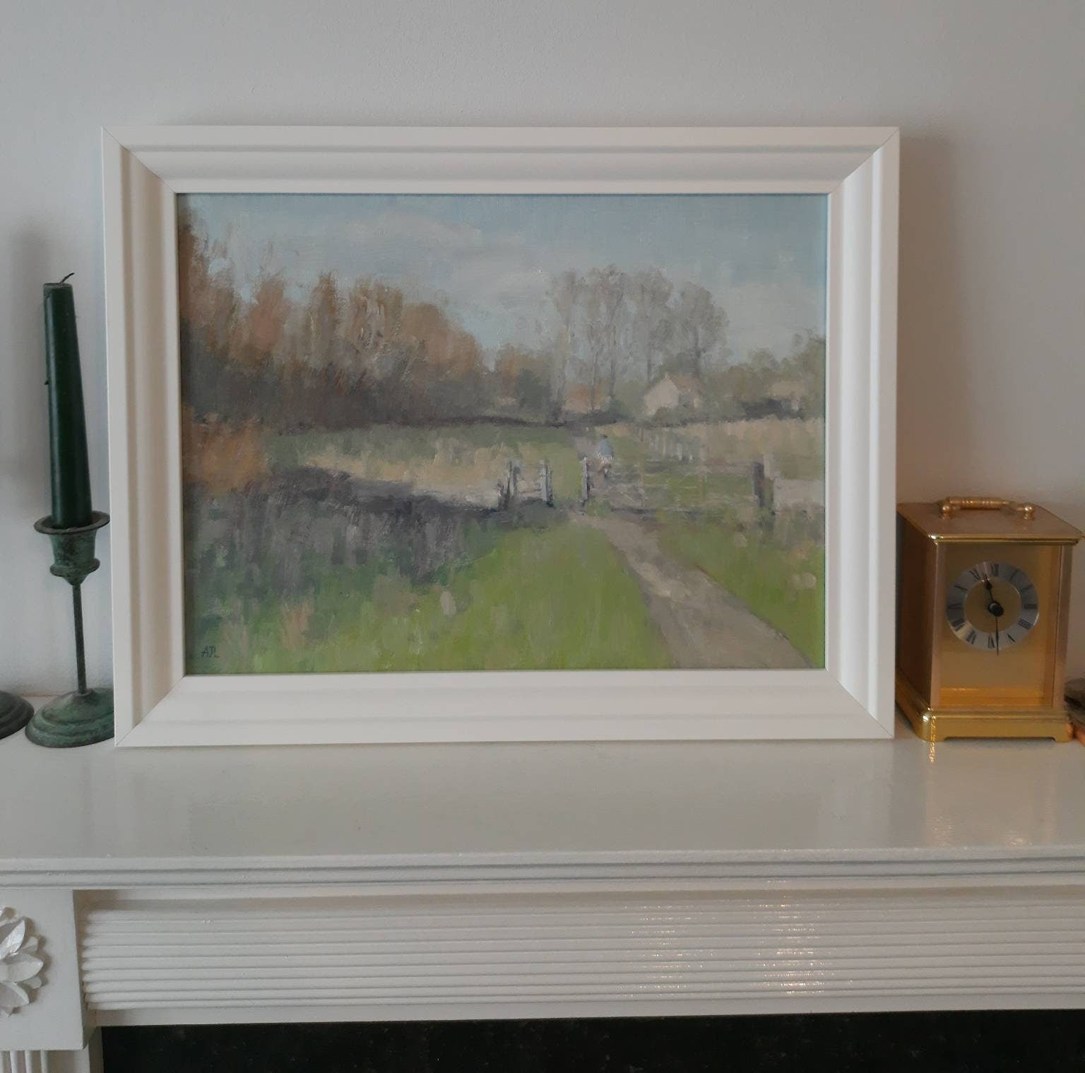 A close-up of the framed artwork.